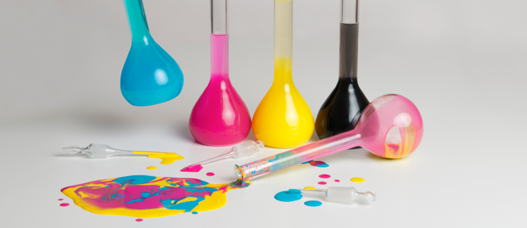 Bold charcoal sketch of scattered lab flasks and droppers with bright color splashes suggesting experimentation and tuning